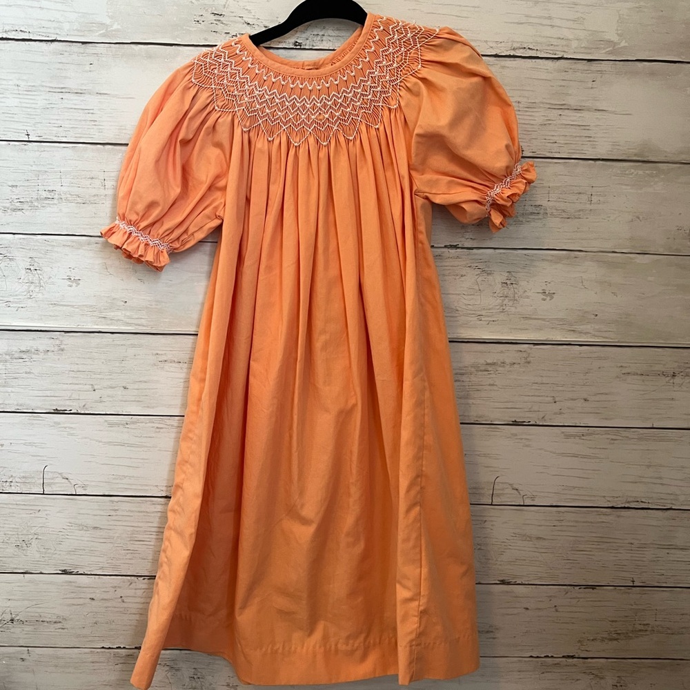 2T Orange smocked dress with pearl accents
